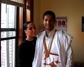 Raquel Evita Saraswati and Nasser Weddady. Nasser is wearing traditional Mauritanian attire.
